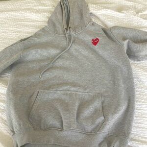 1 Worn ish Play Grey HoodieSize: XL. 1 Comme des Garçons PLAY Hooded Sweatshirt.